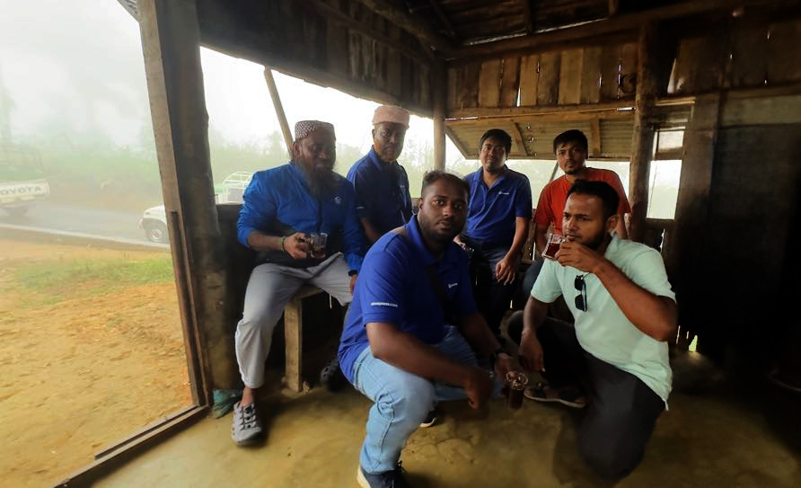 Enjoying tea at Dim Pahar tea stall with the foggy clouds